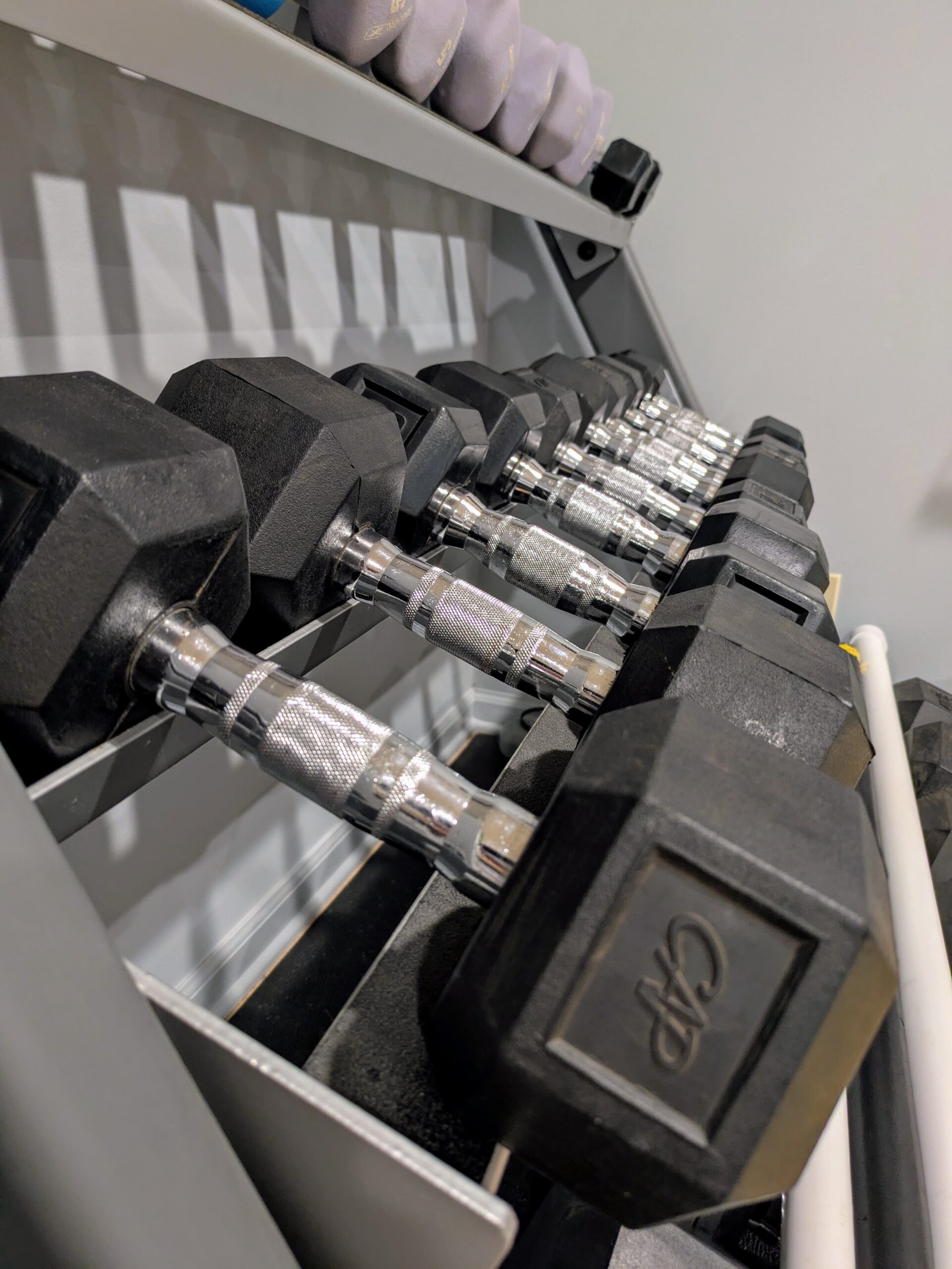 PXL_20250702_000351023~2 rack of dumbbells