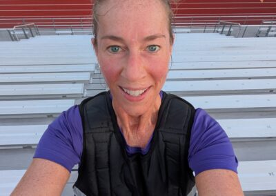 Coach Jennifer using a weighted vest to walk